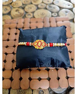 Red flat flower rakhi